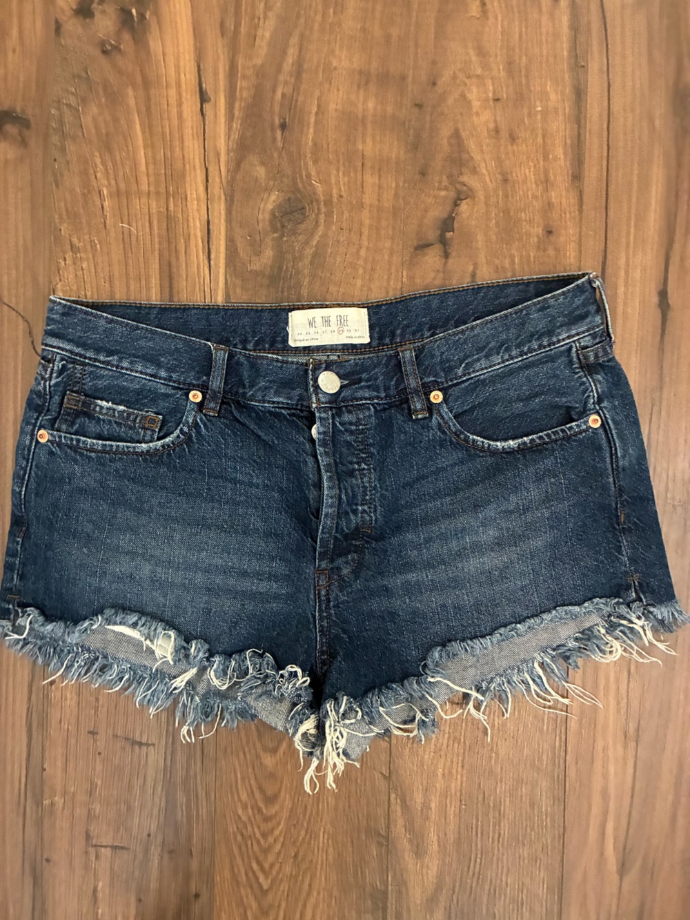 We The Free Dark Blue Denim Shorts with Button Fly and Frayed Hem